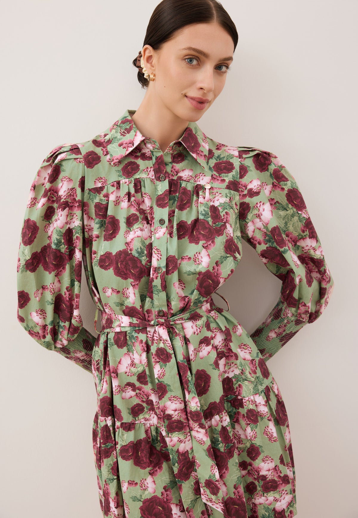 Green SOREZIA mini dress with floral print.