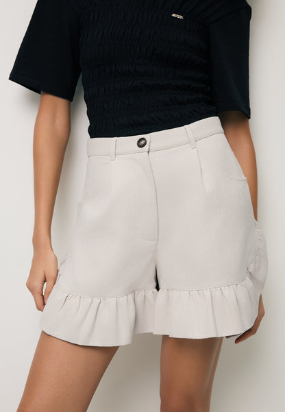 Cream NEYO shorts finished with ruffles