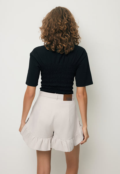 Cream NEYO shorts finished with ruffles