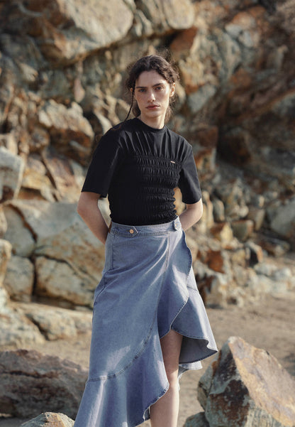 Blue NIIA denim skirt with a ruffle