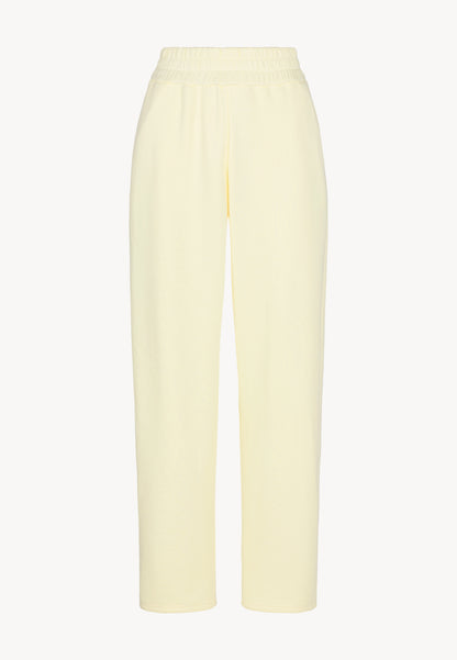 Yellow sweatpants with logoed label TASPY