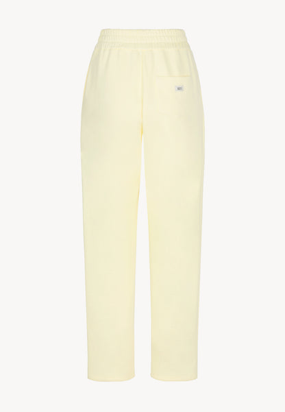 Yellow sweatpants with logoed label TASPY