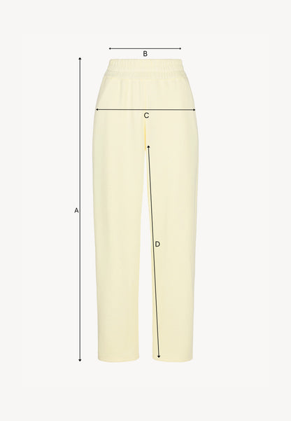 Yellow sweatpants with logoed label TASPY
