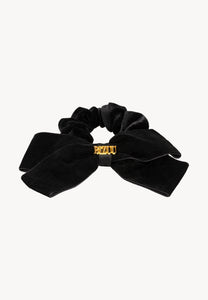 Black VELOURA scrunchie with bow and gold logo