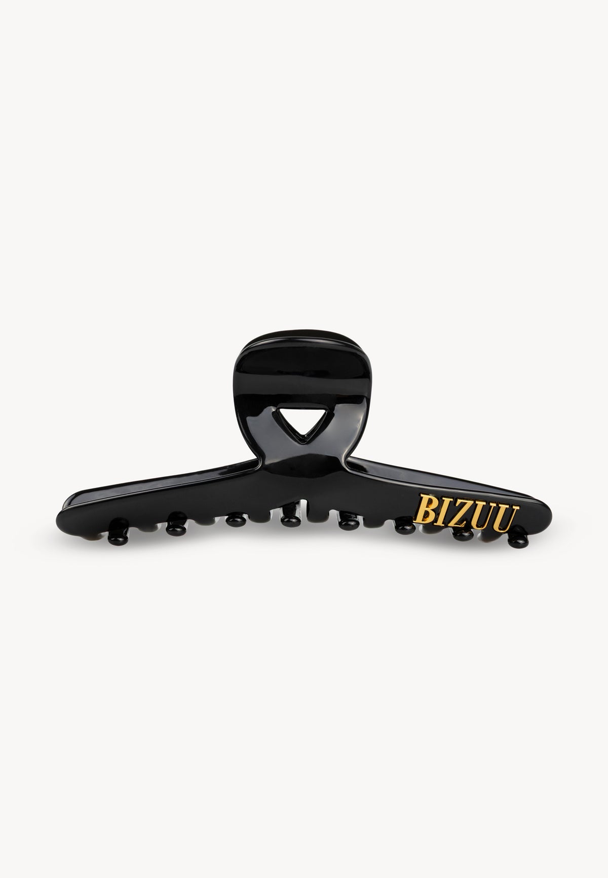 Elongated WILDA hair clip with gold BIZUU logo.