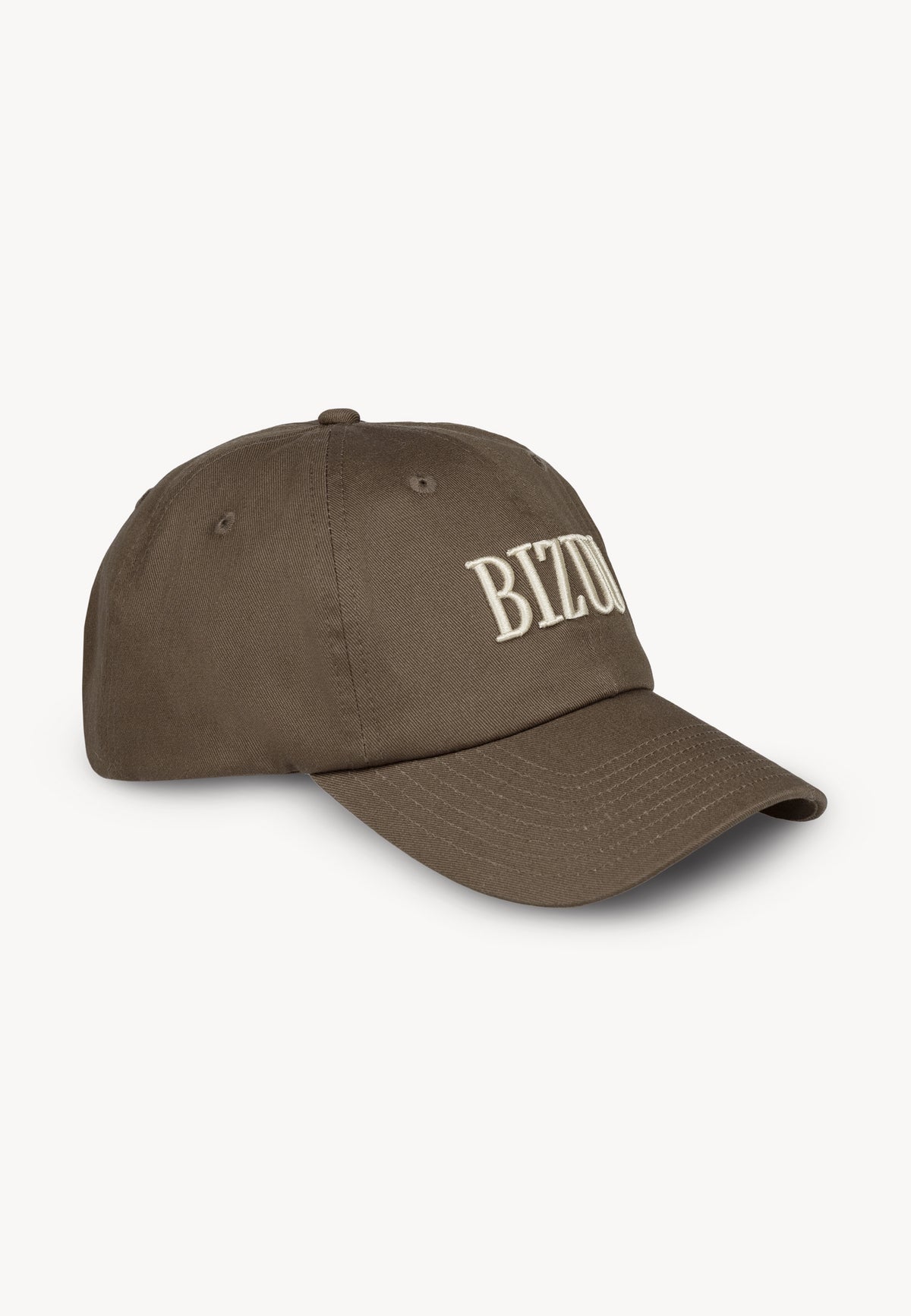 Side view of the brown ZANE cap.