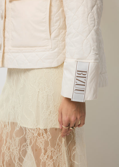 Cream quilted jacket with a decorative collar ZANNI