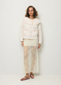 A cream FLACE lace skirt.