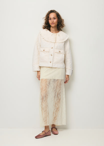 A cream FLACE lace skirt.
