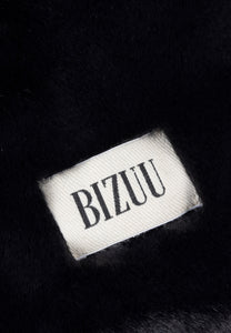 Black faux fur ROKKA gloves with a branded logo label.