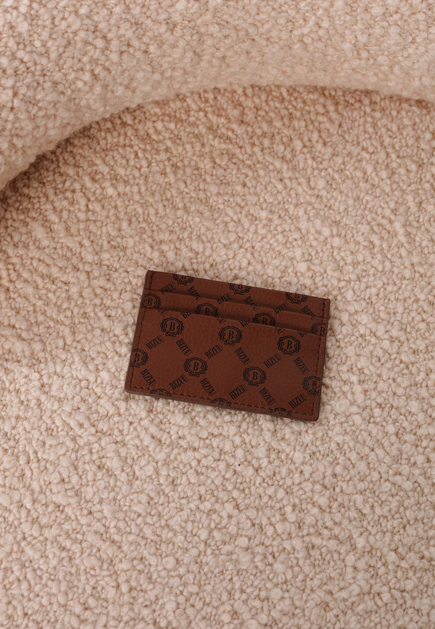 HOLDIE brown card case with a logo print