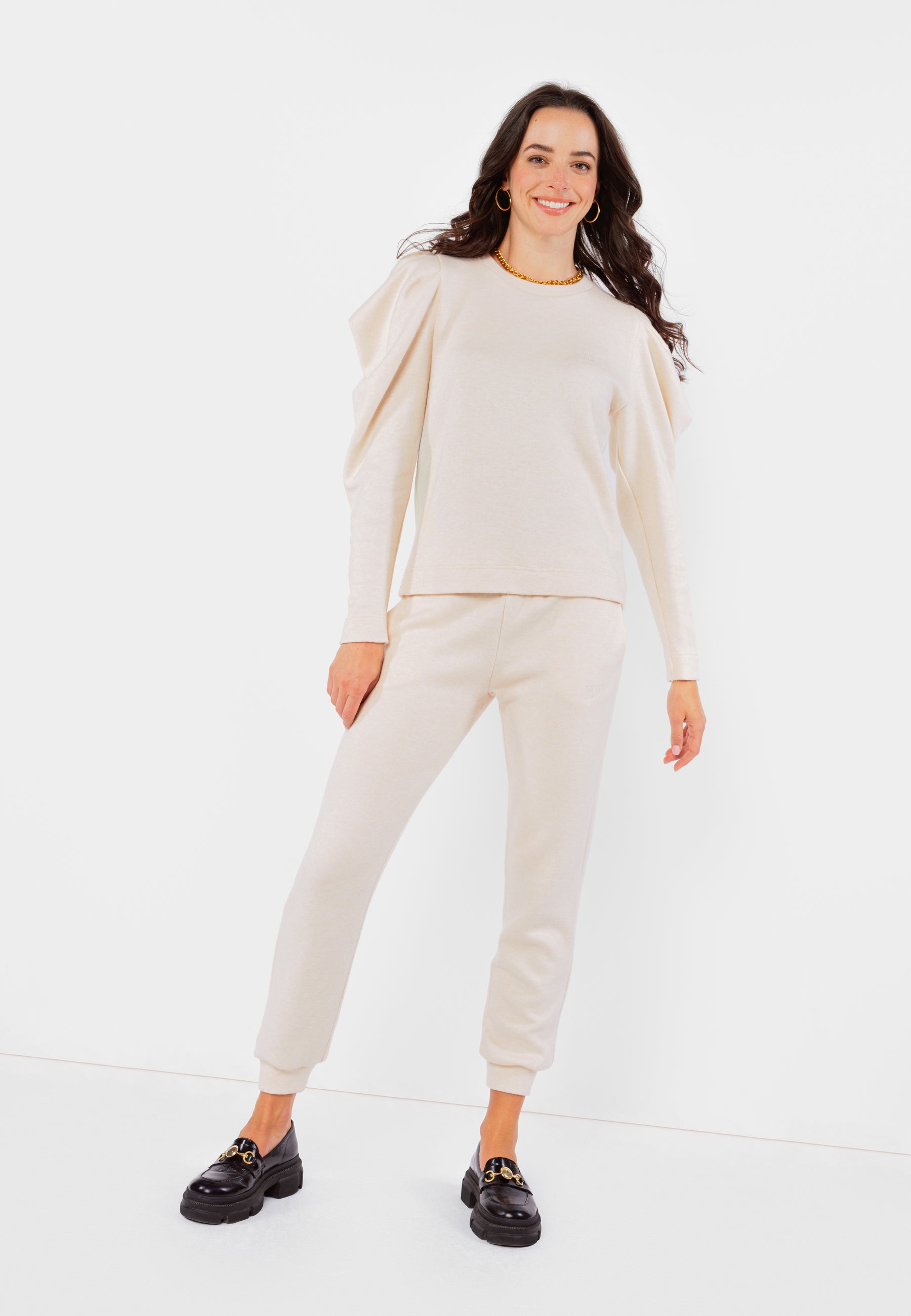 IDIKA beige knitted trousers with a logo