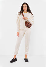 Load image into Gallery viewer, IDIKA beige knitted trousers with a logo