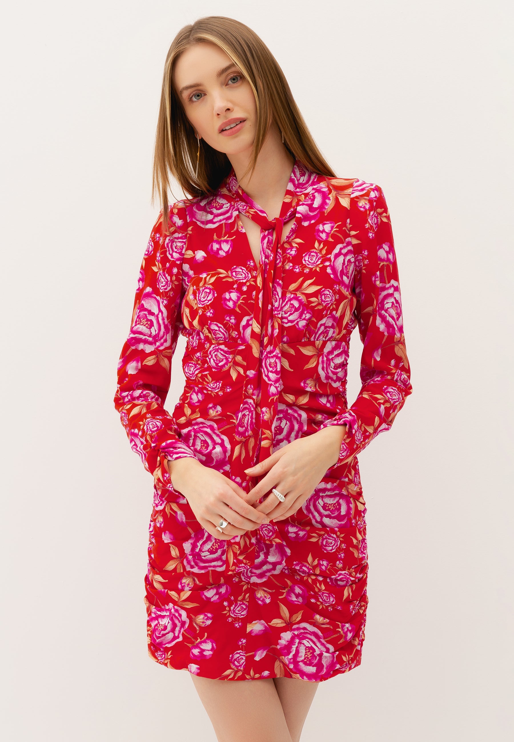 RAKMA GUTER mini dress with a botanical print