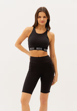 Load image into Gallery viewer, GRETIA black biker shorts with a branded side stripe