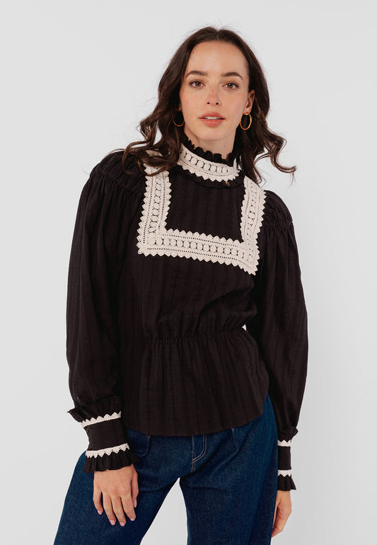 NERANA patterned blouse with the eye-catching neckline in black